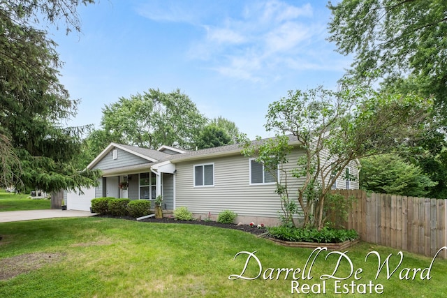 6662 Adaridge Dr SE, Ada, MI 49301 - ranch-style home featuring an attached garage and driveway