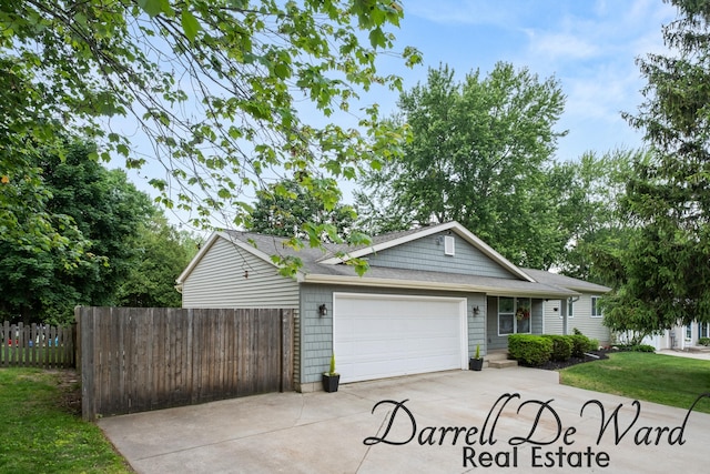 6662 Adaridge Dr SE, Ada, MI 49301 - single story home featuring driveway, an attached garage, and roof with shingles