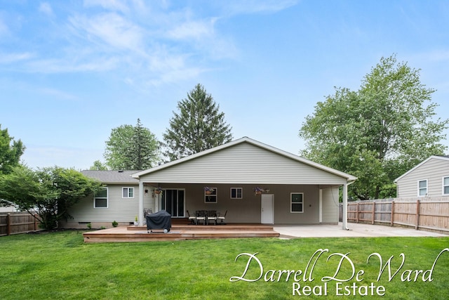 6662 Adaridge Dr SE, Ada, MI 49301 - back of house with a deck and a patio