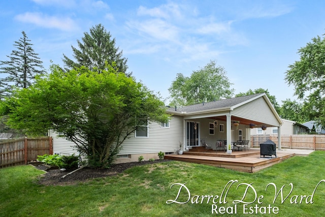 6662 Adaridge Dr SE, Ada, MI 49301 - back of house with a fenced backyard, a wooden deck, and a ceiling fan