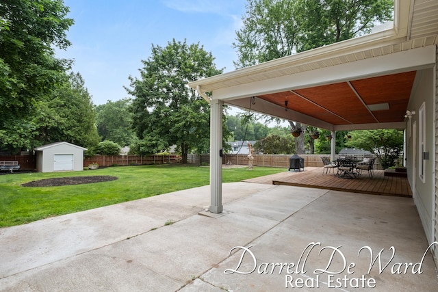 6662 Adaridge Dr SE, Ada, MI 49301 - fenced backyard featuring a patio, a shed, a deck, and outdoor dining area