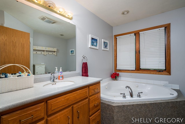 5151 Scotch Mist Dr, Saranac, MI 48881 - full bath with vanity and a whirlpool tub