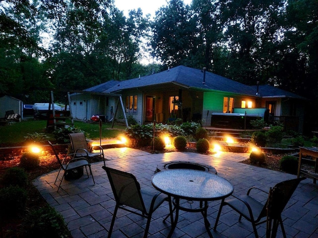 5151 Scotch Mist Dr, Saranac, MI 48881 - view of patio / terrace with a fire pit