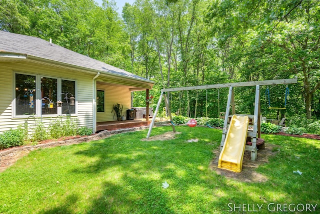 5151 Scotch Mist Dr, Saranac, MI 48881 - view of green lawn featuring a playground