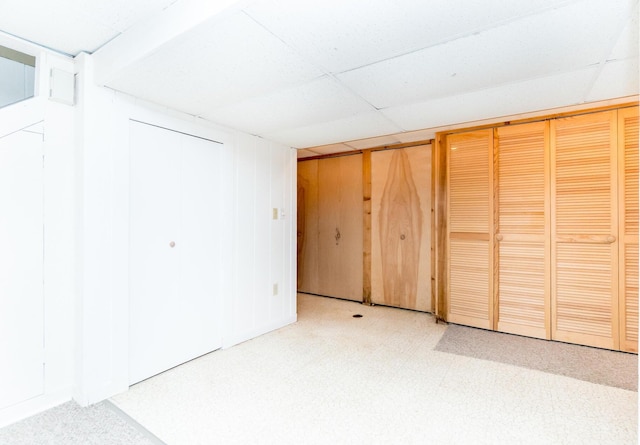 680 Eastlook Dr, Saline, MI 48176 - unfurnished bedroom featuring a paneled ceiling