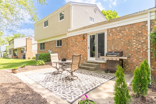 680 Eastlook Dr, Saline, MI 48176 - view of patio featuring entry steps and a grill