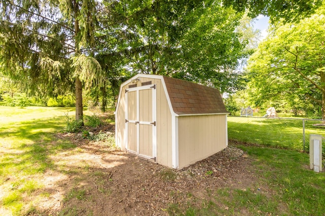 680 Eastlook Dr, Saline, MI 48176 - view of shed with view of wooded area