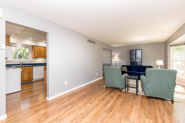 680 Eastlook Dr, Saline, MI 48176 - living area with light wood-type flooring, plenty of natural light, and recessed lighting