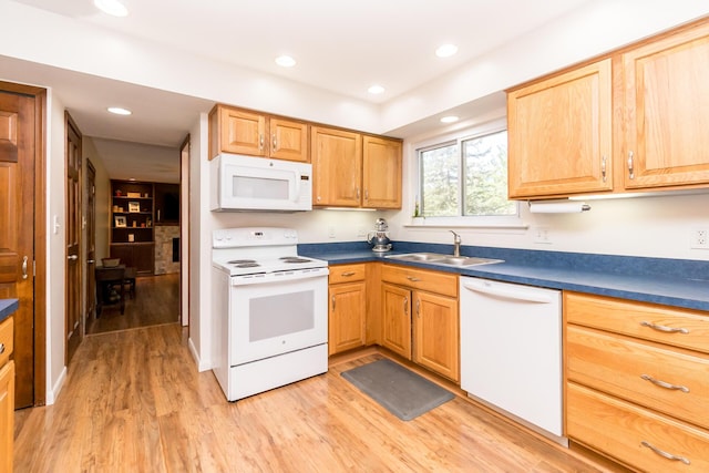 680 Eastlook Dr, Saline, MI 48176 - kitchen with white appliances, light wood finished floors, dark countertops, and recessed lighting