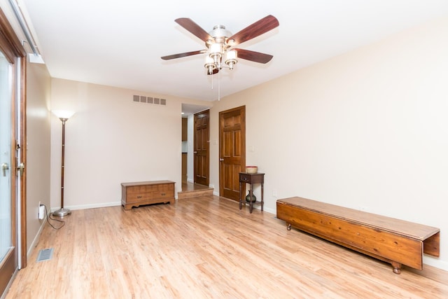 680 Eastlook Dr, Saline, MI 48176 - spare room with wood finished floors and a ceiling fan