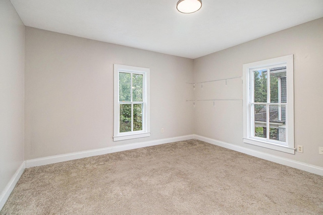 916 Osborne St, Kalamazoo, MI 49001 - carpeted empty room with baseboards