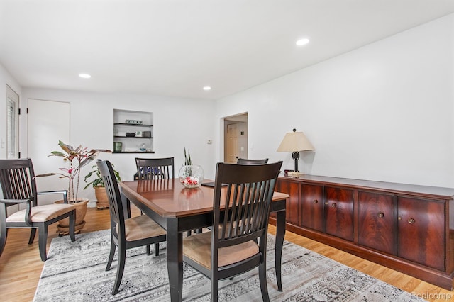 199 Grand Ave, Grand Haven, MI 49417 - dining space with light wood-style floors and recessed lighting