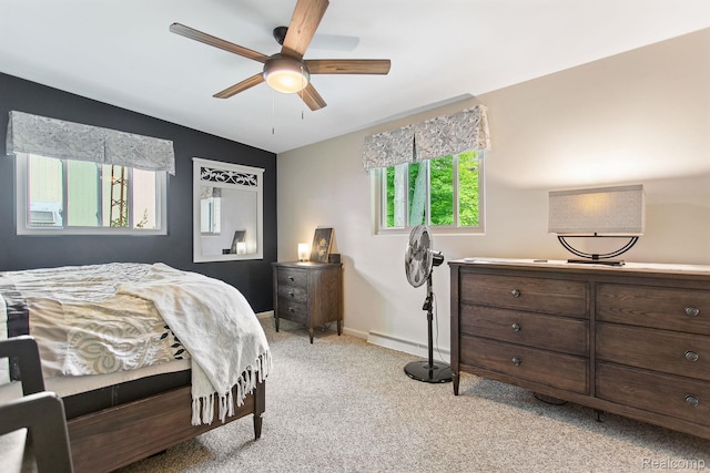 199 Grand Ave, Grand Haven, MI 49417 - bedroom featuring light colored carpet and a ceiling fan