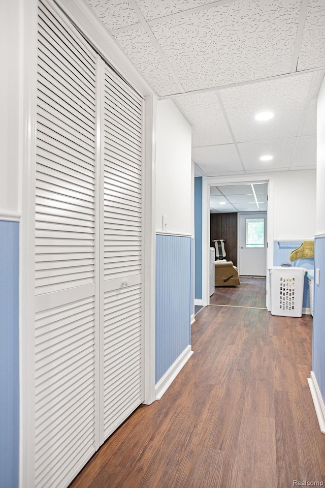 199 Grand Ave, Grand Haven, MI 49417 - corridor with wood finished floors, a paneled ceiling, recessed lighting, and wainscoting