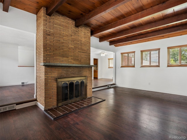 23400 Marlow St, Oak Park, MI 48237 - unfurnished living room featuring a wooden ceiling with exposed beams, hardwood / wood-style floors, a fireplace, a ceiling fan, and a baseboard radiator