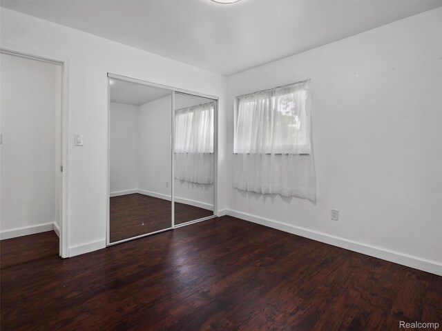 23400 Marlow St, Oak Park, MI 48237 - unfurnished bedroom with wood finished floors and a closet