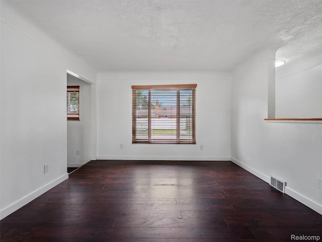 23400 Marlow St, Oak Park, MI 48237 - empty room with hardwood / wood-style floors and a textured ceiling