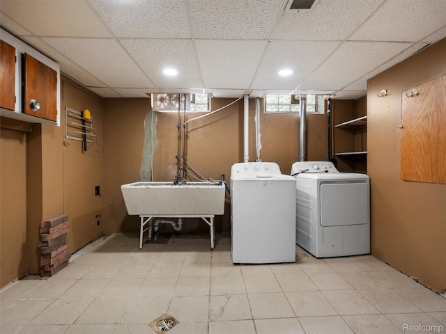 23400 Marlow St, Oak Park, MI 48237 - washroom with washing machine and dryer and cabinet space