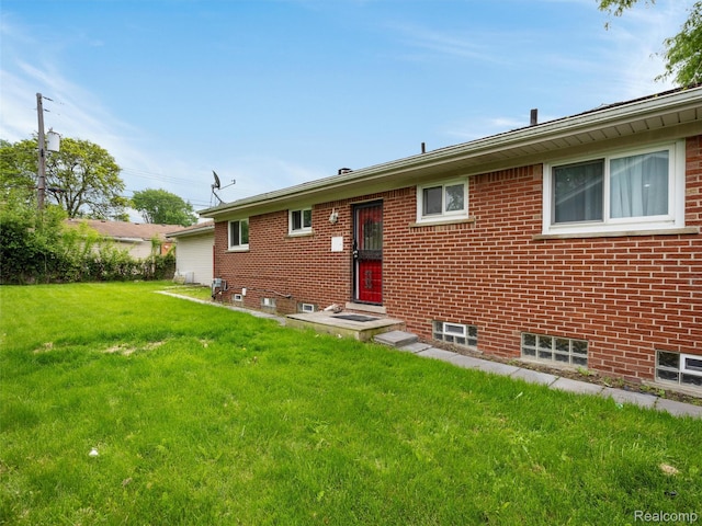 23400 Marlow St, Oak Park, MI 48237 - rear view of property featuring a yard and brick siding