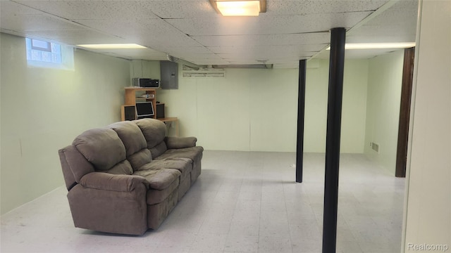 3335 Linden St, Dearborn, MI 48124 - basement featuring electric panel, a drop ceiling, and light floors