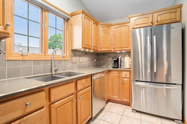 541 Tournament Cir Unit 14, Norton Shores, MI 49444 - kitchen featuring stainless steel appliances, light tile patterned flooring, and backsplash