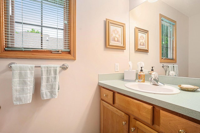 541 Tournament Cir Unit 14, Norton Shores, MI 49444 - bathroom featuring vanity