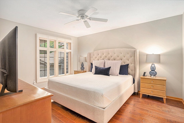 541 Tournament Cir Unit 14, Norton Shores, MI 49444 - bedroom with hardwood / wood-style flooring and a ceiling fan