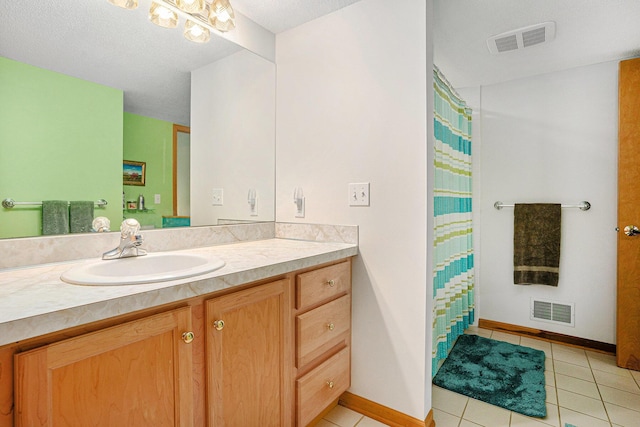 541 Tournament Cir Unit 14, Norton Shores, MI 49444 - full bath with vanity, tile patterned floors, and a shower with shower curtain