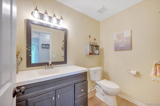 737 Camilla Blvd, Lake Orion, MI 48362 - bathroom with vanity and wood finished floors