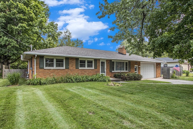 6361 Plainfield Ave, Kalamazoo, MI 49048 - ranch-style home featuring concrete driveway, brick siding, a garage, and a chimney
