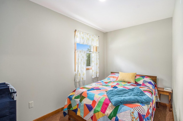 6361 Plainfield Ave, Kalamazoo, MI 49048 - bedroom with wood finished floors and baseboards