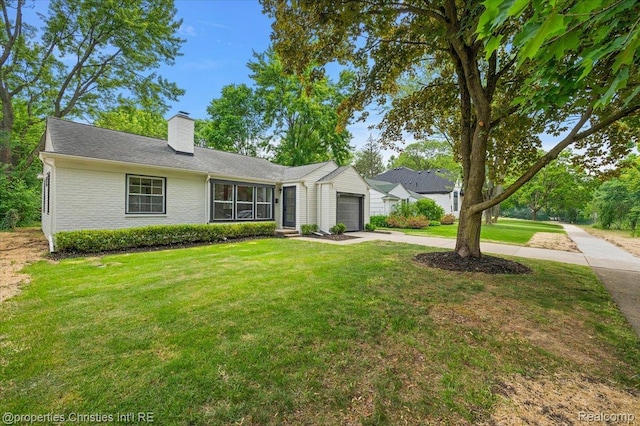 15589 Kirkshire Ave, Beverly Hills, MI 48025 - view of front of property featuring concrete driveway, an attached garage, a chimney, a front yard, and brick siding