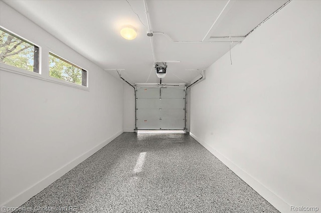15589 Kirkshire Ave, Beverly Hills, MI 48025 - garage with a garage door opener and baseboards