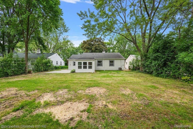 15589 Kirkshire Ave, Beverly Hills, MI 48025 - back of property with a yard and a patio