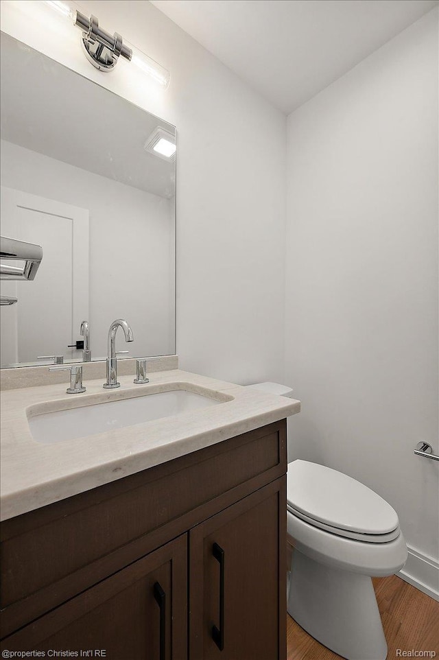 15589 Kirkshire Ave, Beverly Hills, MI 48025 - bathroom featuring vanity and wood finished floors