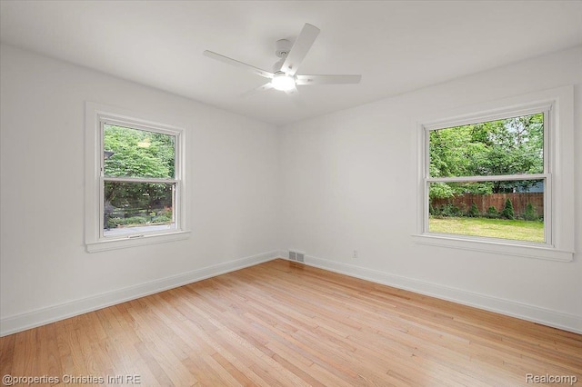 15589 Kirkshire Ave, Beverly Hills, MI 48025 - unfurnished room with healthy amount of natural light, light wood-style floors, and a ceiling fan