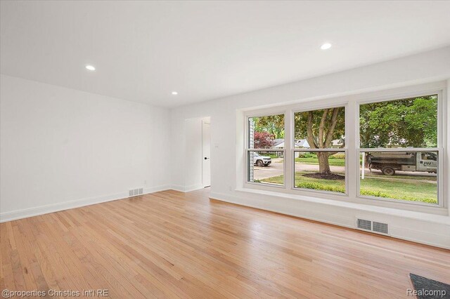15589 Kirkshire Ave, Beverly Hills, MI 48025 - empty room with light wood finished floors and recessed lighting