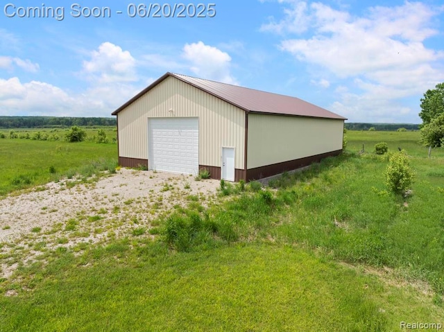 18031 State Highway M28, Newberry, MI 49868 - detached garage with a view of rural / pastoral area