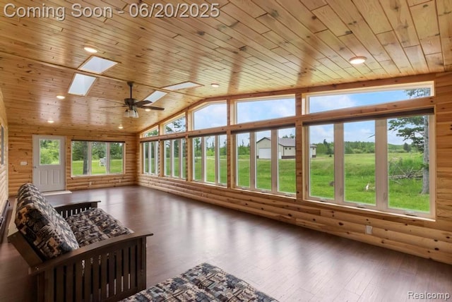 18031 State Highway M28, Newberry, MI 49868 - sunroom featuring wood ceiling, a skylight, wood-type flooring, rustic walls, and high vaulted ceiling