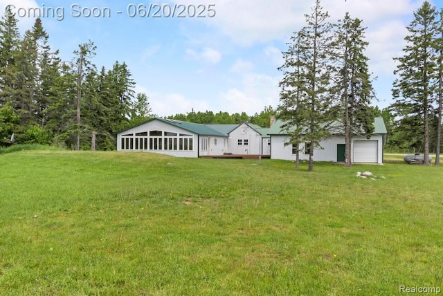18031 State Highway M28, Newberry, MI 49868 - view of green lawn with a wooden deck