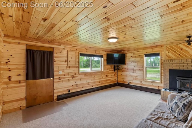 18031 State Highway M28, Newberry, MI 49868 - living room featuring wooden ceiling, wooden walls, and carpet flooring
