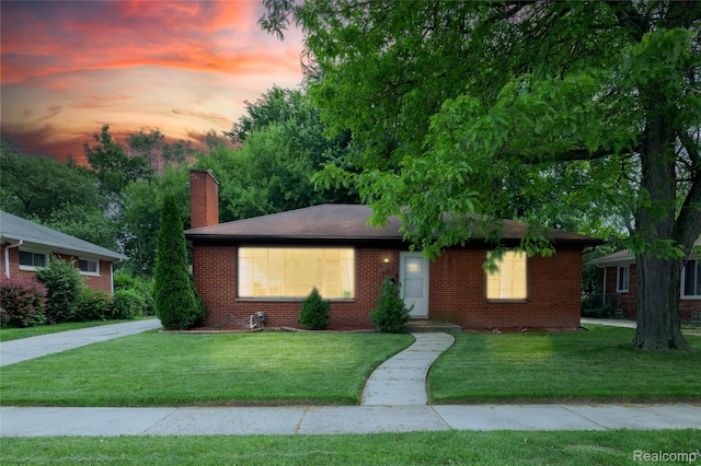 16788 Lincoln Ave, Eastpointe, MI 48021 - single story home featuring a front lawn, a chimney, and brick siding
