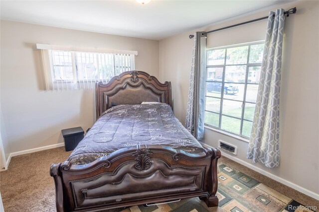 16788 Lincoln Ave, Eastpointe, MI 48021 - carpeted bedroom featuring multiple windows