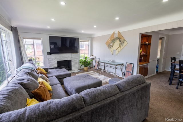 16788 Lincoln Ave, Eastpointe, MI 48021 - living room with recessed lighting, carpet flooring, and a fireplace