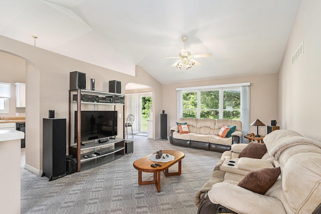 13380 Park Blvd W, Vicksburg, MI 49097 - living room with arched walkways, light carpet, ceiling fan, and vaulted ceiling