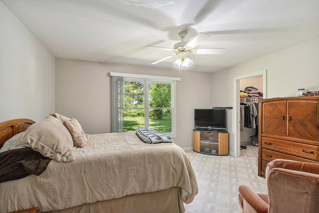 13380 Park Blvd W, Vicksburg, MI 49097 - bedroom with a spacious closet, light carpet, ceiling fan, and a closet