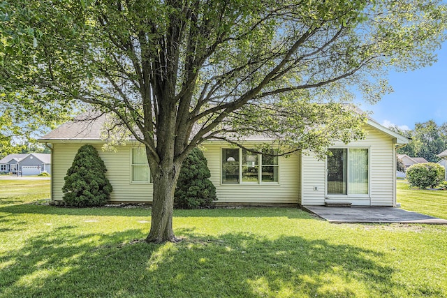 13380 Park Blvd W, Vicksburg, MI 49097 - rear view of property with a yard and a patio