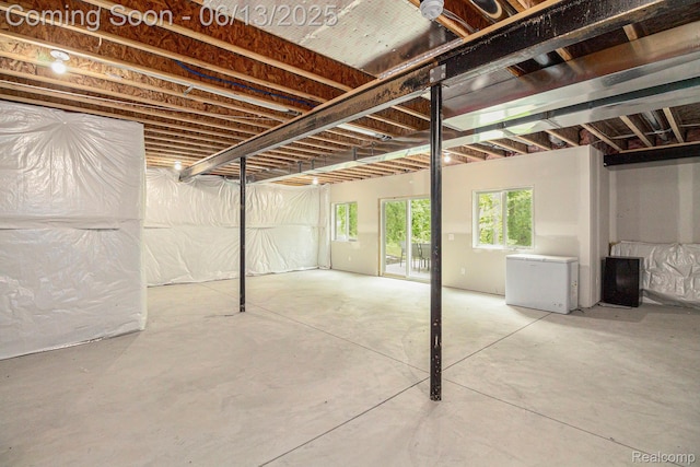 5950 Mountain Top Dr, Brighton, MI 48116 - basement featuring refrigerator