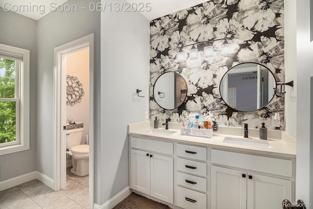 5950 Mountain Top Dr, Brighton, MI 48116 - bathroom with double vanity and tile patterned flooring