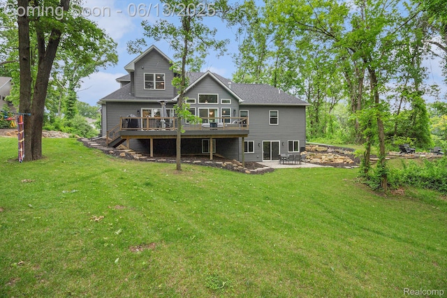 5950 Mountain Top Dr, Brighton, MI 48116 - rear view of house featuring a wooden deck, a patio area, a yard, and stairs